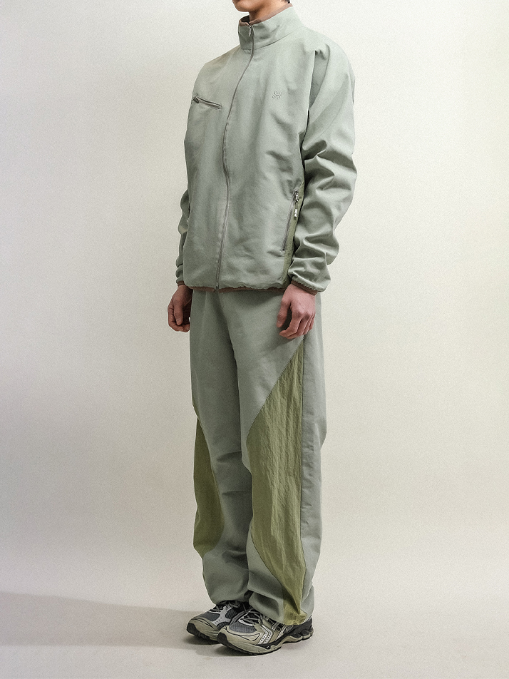 ASYMMETRIC WAVE ZIPPED JACKET-EARTHY GREEN