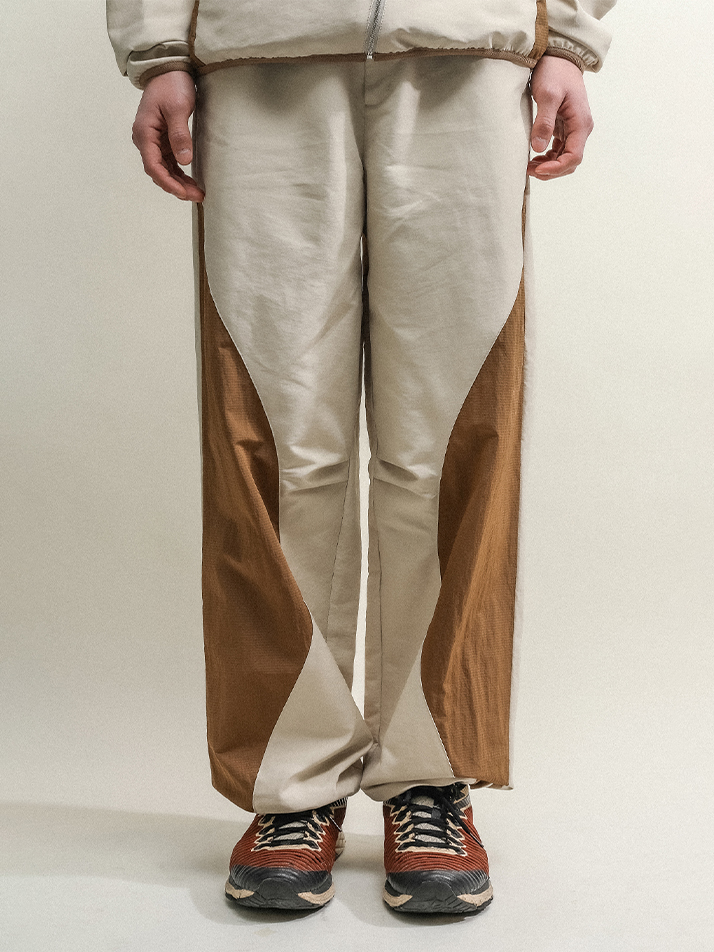 ASYMMETRIC WAVE PANTS-BROWN ECRU