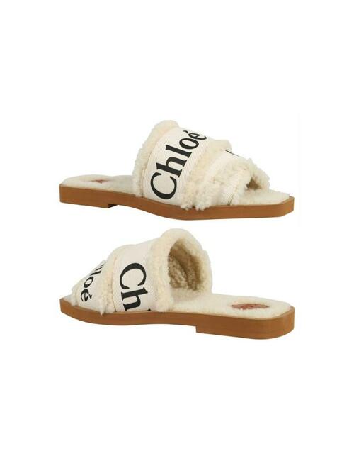 [끌로에] 우디 로고 스트랩 시어링 샌들 화이트 CHC21W543U5 101